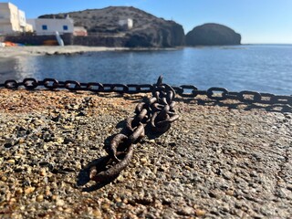 Beach front dock with chain