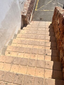 sunny stairs to concreet floor 
