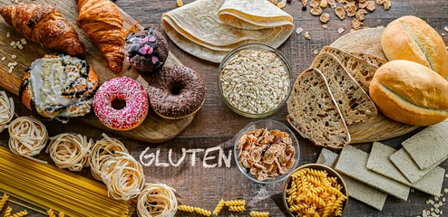 Fototapeten Composition with variety of food products containing gluten © monticellllo