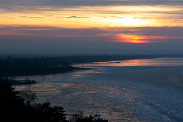 Sunset  at Lake Balaton in wintertime , Hungary - 728020153