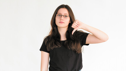 Dislike sign. Bad feedback. Reject no. Negative disapproval. Skeptic woman refusing with thumb down...