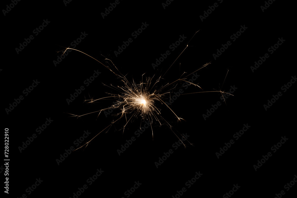 Poster Fireworks bengal Flicker on a dark background. Easy to add lens flare effects for overlay designs or screen blending mode to make high-quality images.