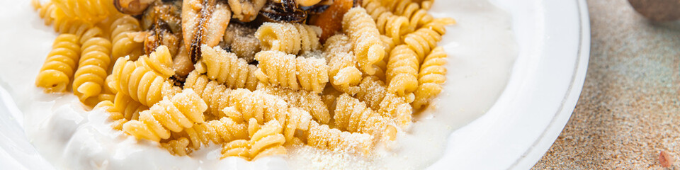 pasta mussel seafood fusilli tasty fresh eating cooking appetizer meal food snack on the table copy space food background rustic top view