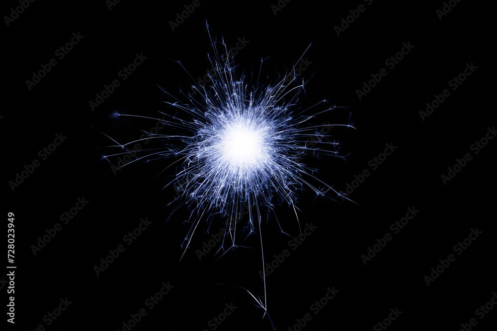 Poster Fireworks bengal Flicker on a dark background. Easy to add lens flare effects for overlay designs or screen blending mode to make high-quality images.