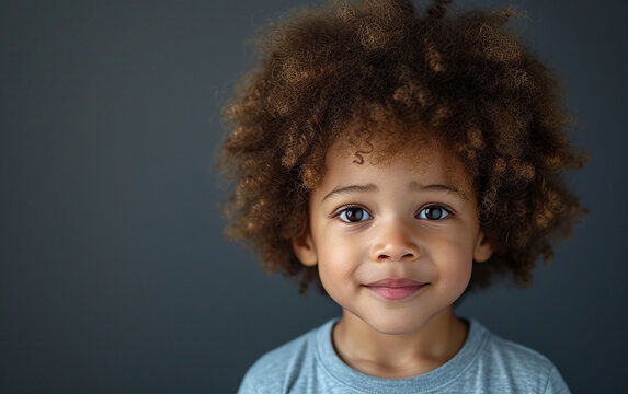 Close-Up Portrait of Multiracial Child With Curly Hair