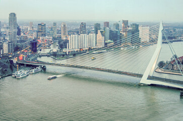 Rotterdam, The Netherlands, January 29, 2024: aerial view of the iconic Erasmus bridge and the city...