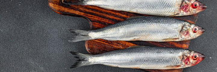 herring fish fresh raw seafood tasty eating cooking appetizer meal food snack on the table copy space food background rustic top view