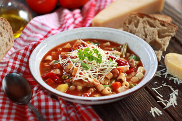 Minestrone soup with pasta and vegetables. Italian food. Selective focus.

