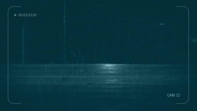 CCTV Cars Pass On Road In The Rain At Night
