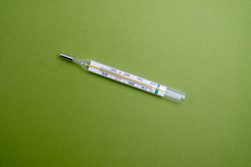 Medical thermometer close-up. Traditional thermometer for measuring body temperature, Medicine and health concept
