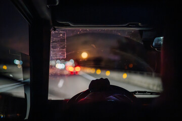 Sotogrante, Spain - January 27, 2024 - Nighttime driving scene from inside a car with a view of the...