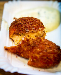 Closeup of half opened shrimp croquette, popular snack in Netherlands .