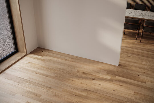 Fototapeta Modern interior design of apartment, dining room with table and chairs, empty living room with white wall.