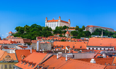 Bratislava, Slovakia: Panoramic rooftop view of Bratislava Castle, the cathedral and the old town - 728060366