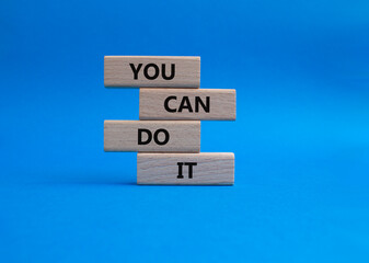 You can do it symbol. Concept words You can do it on wooden blocks. Beautiful blue background. Business and You can do it concept. Copy space.