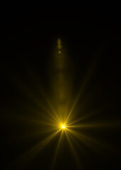 Obraz premium gold sunburst effect background,Lens flare light on black background or Lens flare glow light effect on black background.Easy to add overlay or screen filter over photos