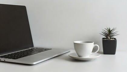 office desk table with laptop and cup