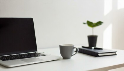 Fototapeta premium office desk table with laptop and cup