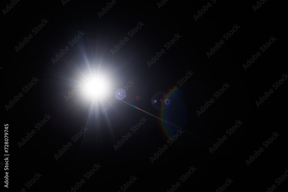 Poster Easy to add lens flare effects for overlay designs or screen blending mode to make high-quality images. Abstract sun burst, digital flare, iridescent glare over black background.