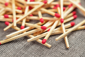 Household matches pile with red heads