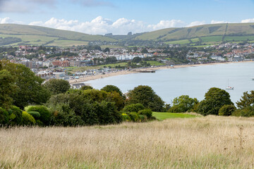 Swanage bay and rolling hills of Ballard down seen from Durlston
