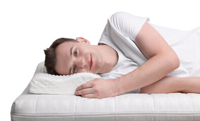 Fototapeta na wymiar Man lying on orthopedic pillow against white background