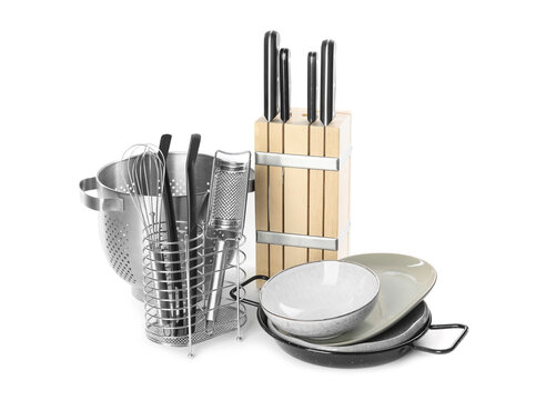 Set of different cooking utensils and dishes on white background