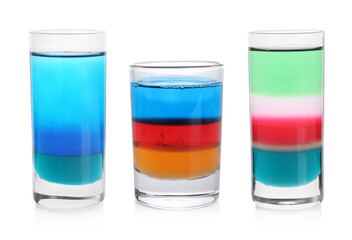 Different shooters in shot glasses isolated on white, set
