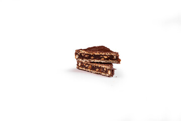 Chocolate candy with wafer and nuts on white background