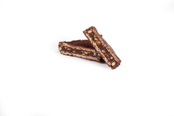 Chocolate candy with wafer and nuts on white background