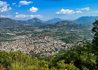 Panorama of the city of Cassino in Italy, view from a hill famous for the history of World War II and from the Benedictine monastery of Monte Cassino - obrazy, fototapety, plakaty