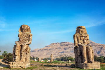 View of the Colossi of Memnon at the entrance to the Valley of the Kings near Luxor, Egypt