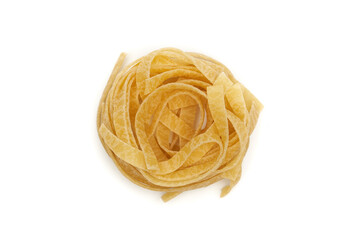 Nest tagliatelle pasta isolated on white