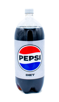 Ocala, FL USA January 4, 2024 Retail store diet Pepsi 2 liter soda pop on display isolated on white background. round red white and blue label logo. refreshment drink produced by Pepsi cola company.