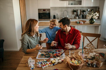 Loving family preparing for an Easter at home
