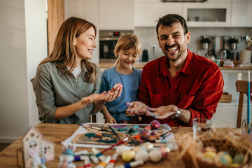 Loving family preparing for an Easter at home