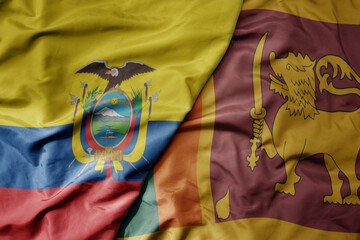 big waving national colorful flag of sri lanka and national flag of ecuador .