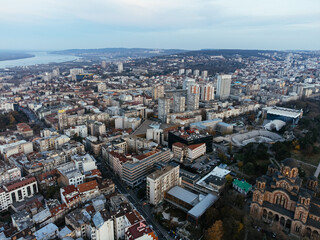 Fototapeta na wymiar The drone view of the St. Mark's Church in the historical downtown center of Belgrade at sunset.