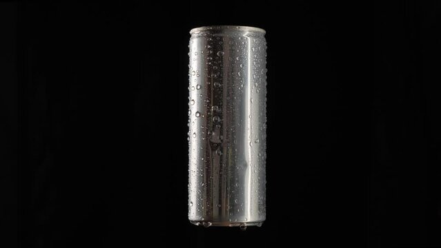 Soda Can Rotates On A Black Background