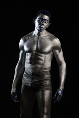 Fototapeta na wymiar Sexy Black Male Silver Color Body Art