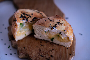 Delicious Cheesy Bread with cilantro and black sesame seeds baked to perfection 