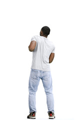 A man, full-length, on a white background, dancing