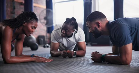 Personal trainer, man and woman with plank on floor for wellness, health and strong core muscle in gym. Mentor, people and advice for development, motivation and workout for abdomen in fitness club
