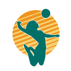 Silhouette of a female volley athlete in action pose. Silhouette of a woman playing volley ball sport.