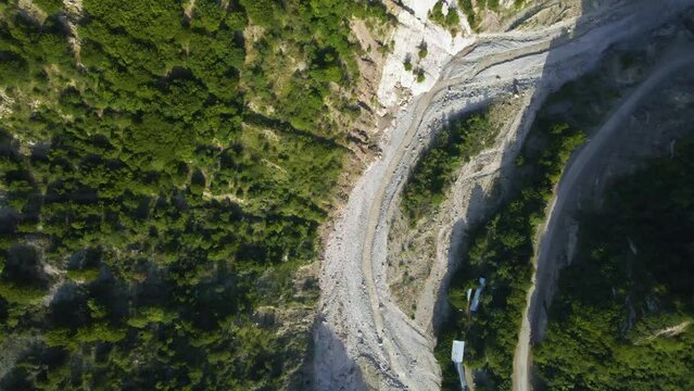 Top down drone shot flying over the Girdimanchay river near Lahic in Azerbaijan.