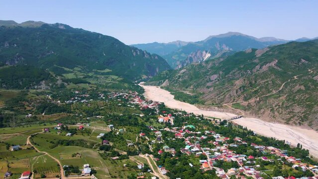 Drone shot flying over the town of Lahic in the Caucasus mountains in Azerbaijan.