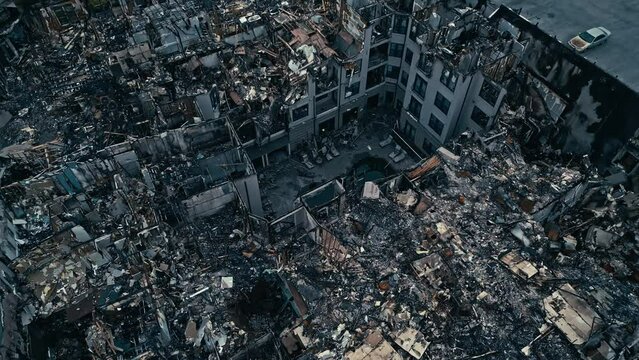 Destroyed burned Down residential area in American city. Fire at night,Catastrophe with homeless community. Aerial top down.