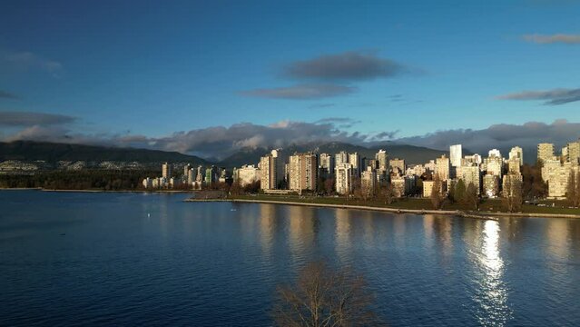 Aerial panoramic of Sunset Beach in Vancouver during the colorful golden hour