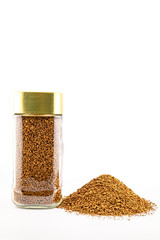 can of instant freeze-dried coffee, roasted to a golden hue, with a gold lid