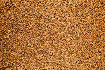 Instant sublimated coffee with a golden hue, background for design